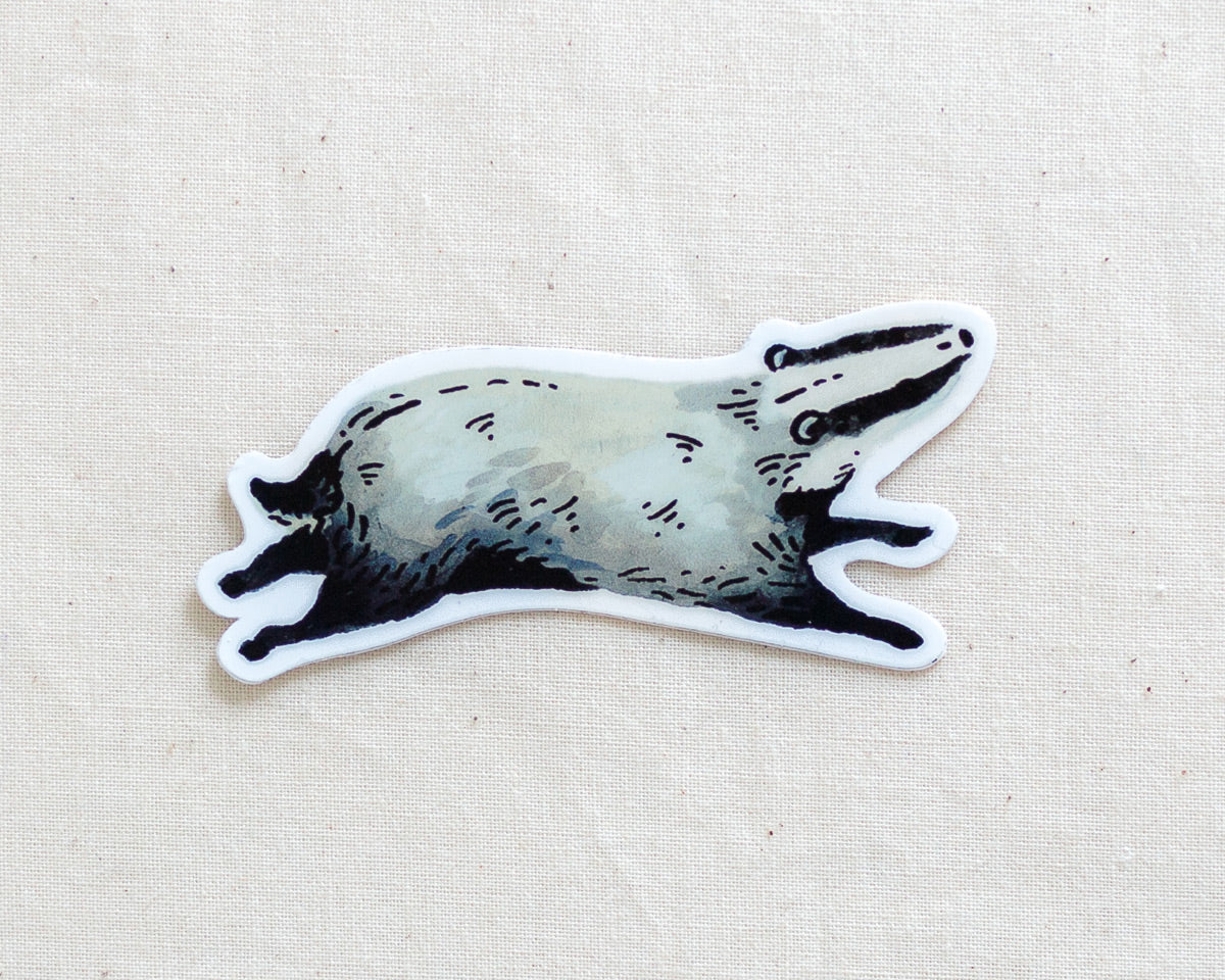 a cute badger vinyl sticker by wildship studio