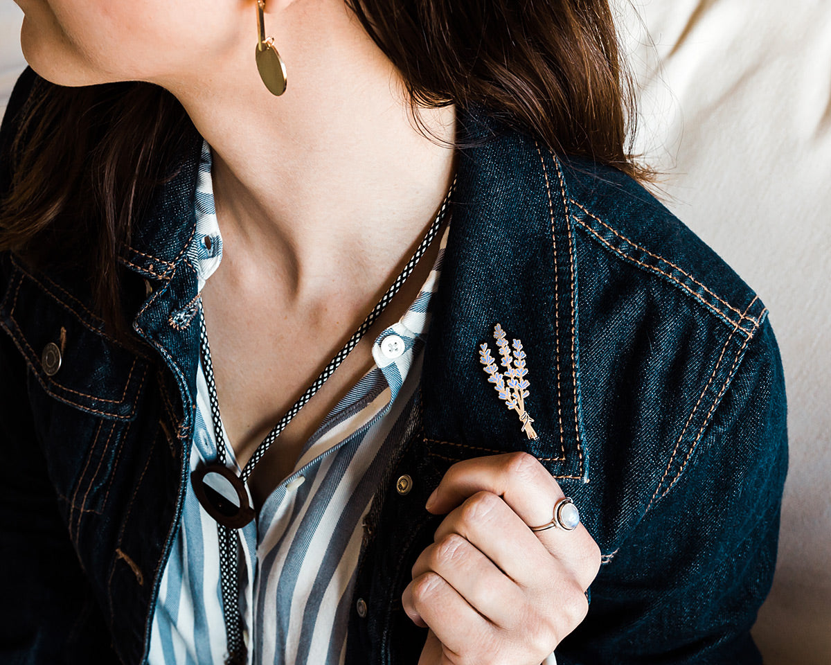 silver floral lavender enamel pin on denim jean jacket cuff